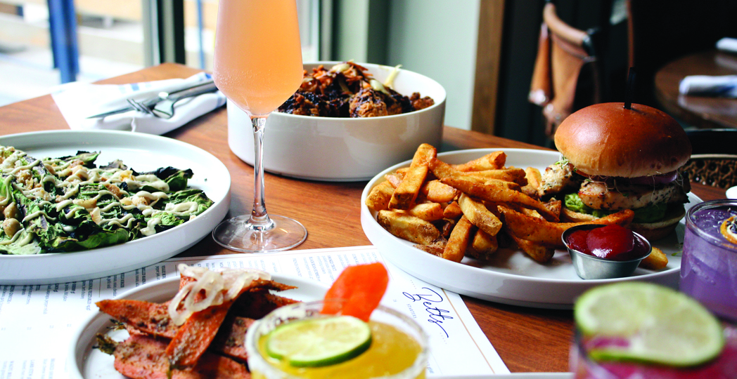 Maya Holtzman, Courtesy Cocky's Bagels, Courtesy Collision Bend Brewing Company, Dylan Palchesko, Courtesy Geraci's Slice Shop, Courtesy Goma, Courtesy Hofbrauhaus Cleveland, Courtesy Lago East Bank, Courtesy Lulo, Courtesy Mabel's BBQ, Christina Rufo